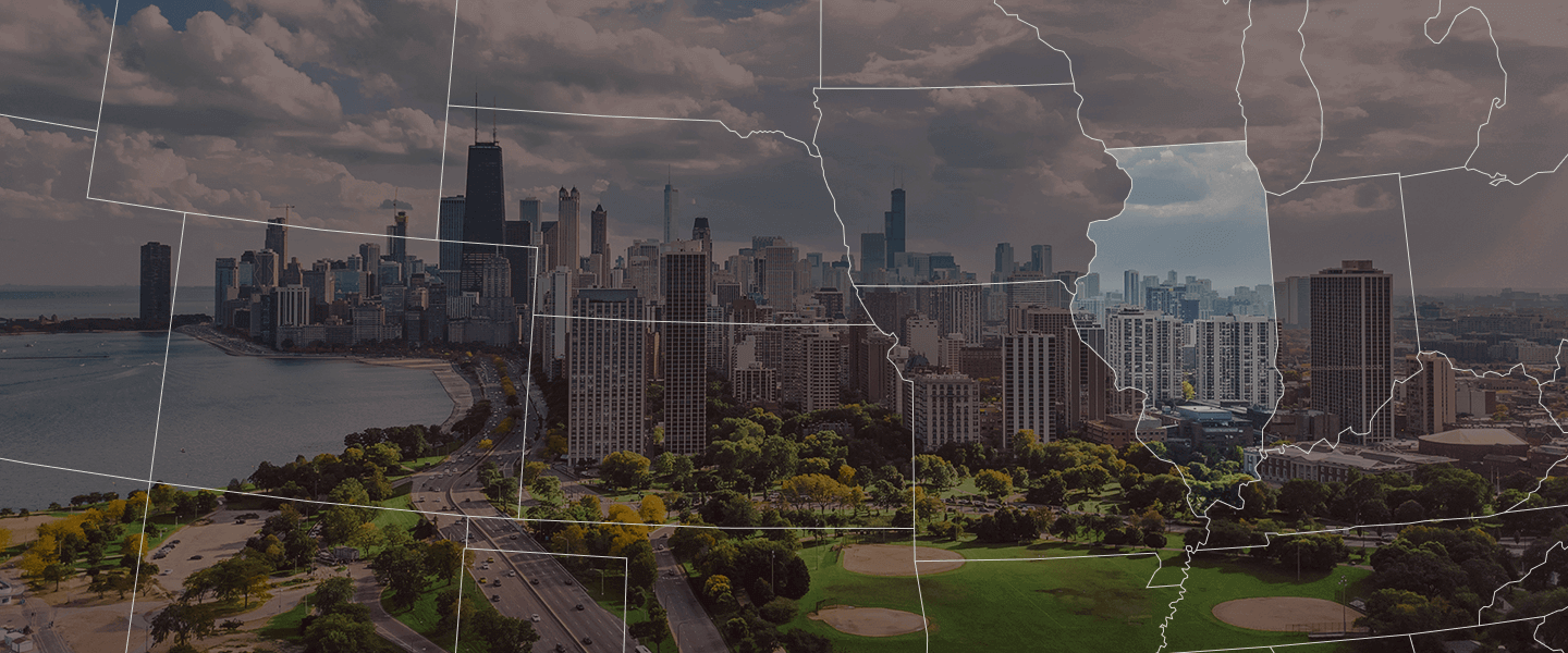 Skyline of Chicago with outline of the state of Illinois over it